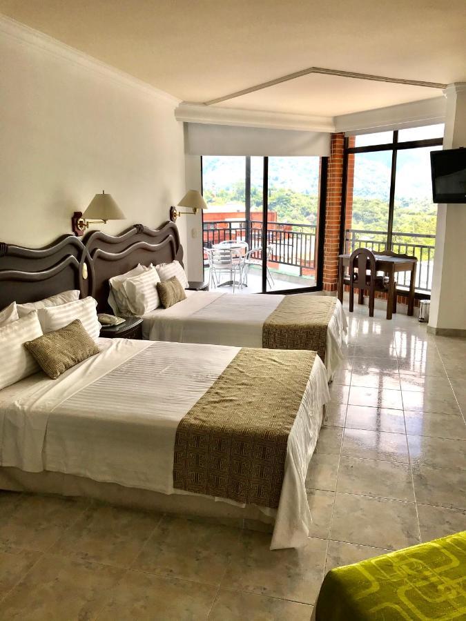 Casa Morales Hotel Internacional Y Centro De Convenciones Ибаге Номер фото