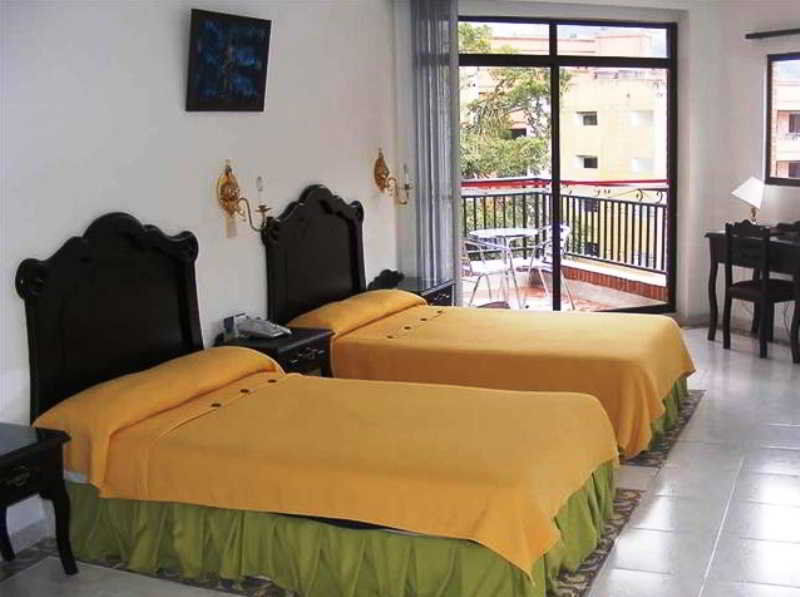 Casa Morales Hotel Internacional Y Centro De Convenciones Ибаге Экстерьер фото