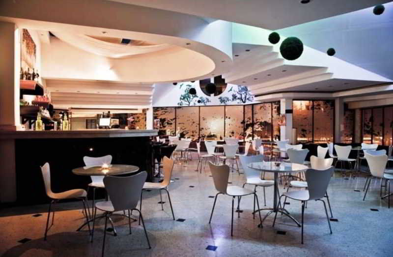 Casa Morales Hotel Internacional Y Centro De Convenciones Ибаге Экстерьер фото The interior of the restaurant